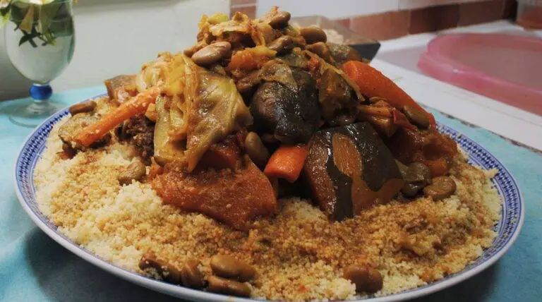 Moroccan Couscous with meat and vegetables and raisins with caramelised onions